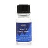 A clear glass bottle of white christmas fragrance oil with a black cap and blue label featuring stars and mountains
