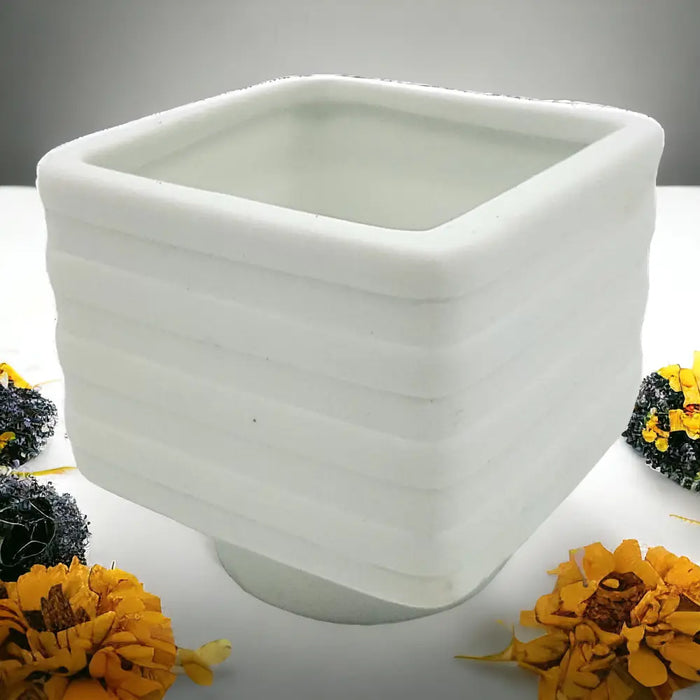 White porcelain tealight holder square design with horizontal ridges 6cm x 6cm ceramic planter style
