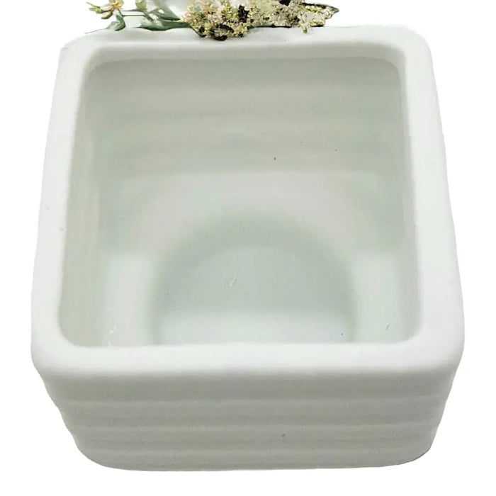 White porcelain tealight holder with banded square design and subtle horizontal ridges 6cm x 6cm ceramic planter