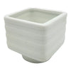 White porcelain tealight holder with banded square design made of ceramic 6cm x 6cm with horizontal ridges