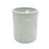 White porcelain tealight holder with star design cutouts in two sizes made of ceramic for votive candles