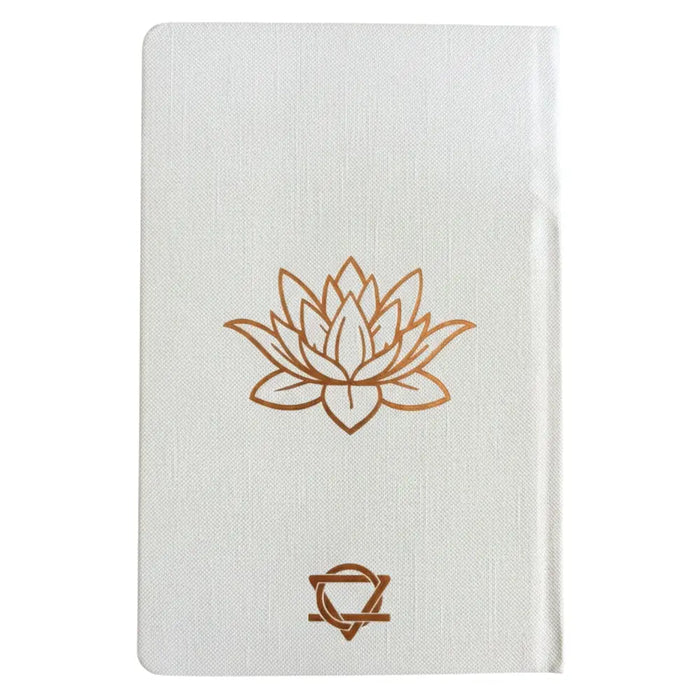 White wellness journal with 120 pages featuring a rose gold tree of life and gold lotus chakra embossing on linen cover