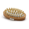 Wooden anti-cellulite massager with light beige rounded bristles on white mesh base made from hemu wood