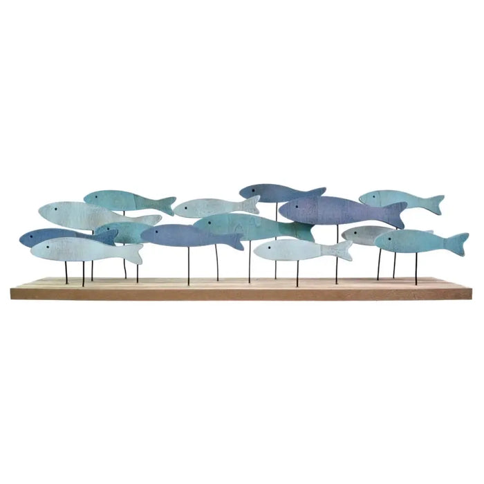 Wooden shoal of fourteen wooden fish with blue and white painted fins on metal rods and light wood base