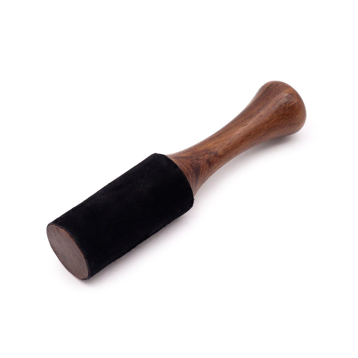 A sleek 19cm wooden stick clothes brush with a wooden handle and a black suede-covered head