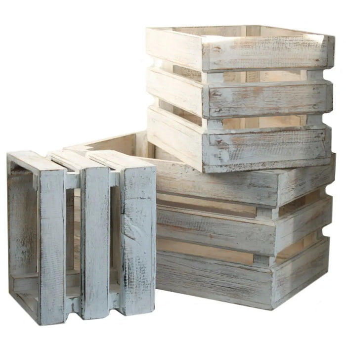 Stacked rustic wooden storage crates with distressed whitewash paint finish made from wood in a set of three