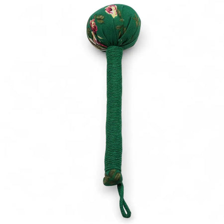 Green floral-patterned fabric wormwood massage hammer with textured rope handle for deep tissue massage
