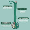 Green rope-wrapped wooden wormwood massage hammer head with floral burlap cover and hanging loop for massage use