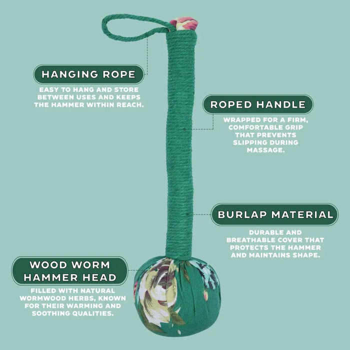 Green rope-wrapped wooden wormwood massage hammer head with floral burlap cover and hanging loop for massage use
