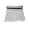 A light gray woven woollen shawl with a subtle herringbone weave and fringed edges for warmth and style