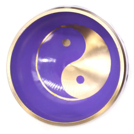 Purple and gold tibetan singing bowl set with yin yang symbol and yang symbol design in white and purple colors