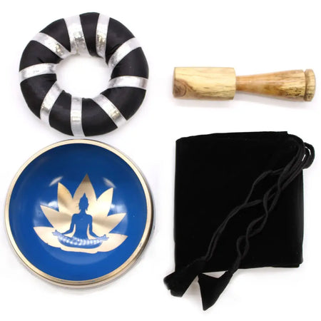 Blue singing bowl with gold lotus and buddha design from yoga moves singing bowl set in white and blue colors